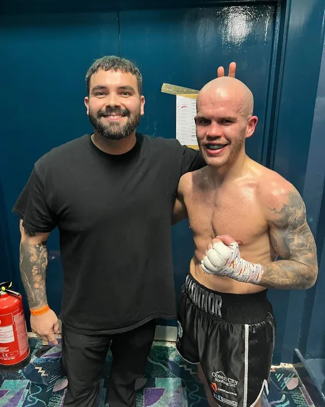 Marlee Dann with Bradley O'Connor after a fight, Bradley in black O'Connor shorts